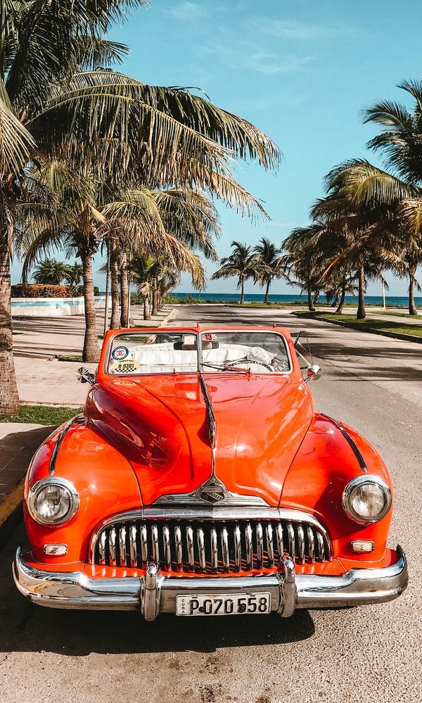 orange car on asphalt road